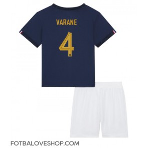 Francie Raphael Varane #4 Dětské Domácí Dres MS 2022 Krátký Rukáv (+ trenýrky)