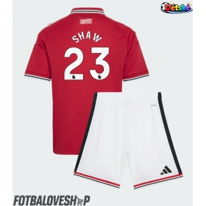 Manchester United Luke Shaw #23 Dětské Domácí Dres 2026-27 Krátký Rukáv (+ trenýrky)